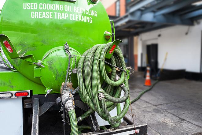 septic tank pump truck in operation in Bartlett, IL